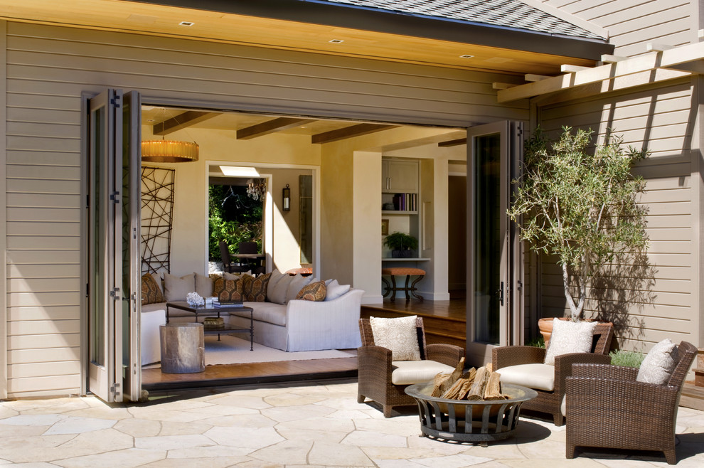 Design ideas for a transitional patio in San Francisco with a fire feature.