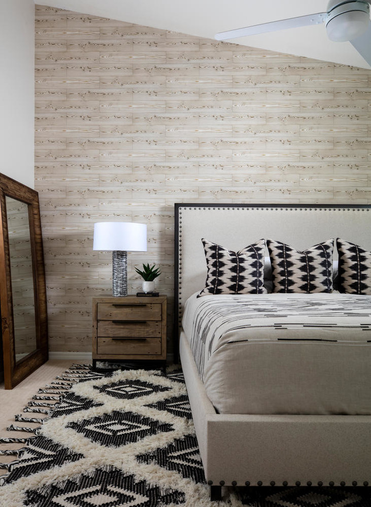 Photo of a mid-sized country master bedroom in Miami with beige walls, carpet and black floor.