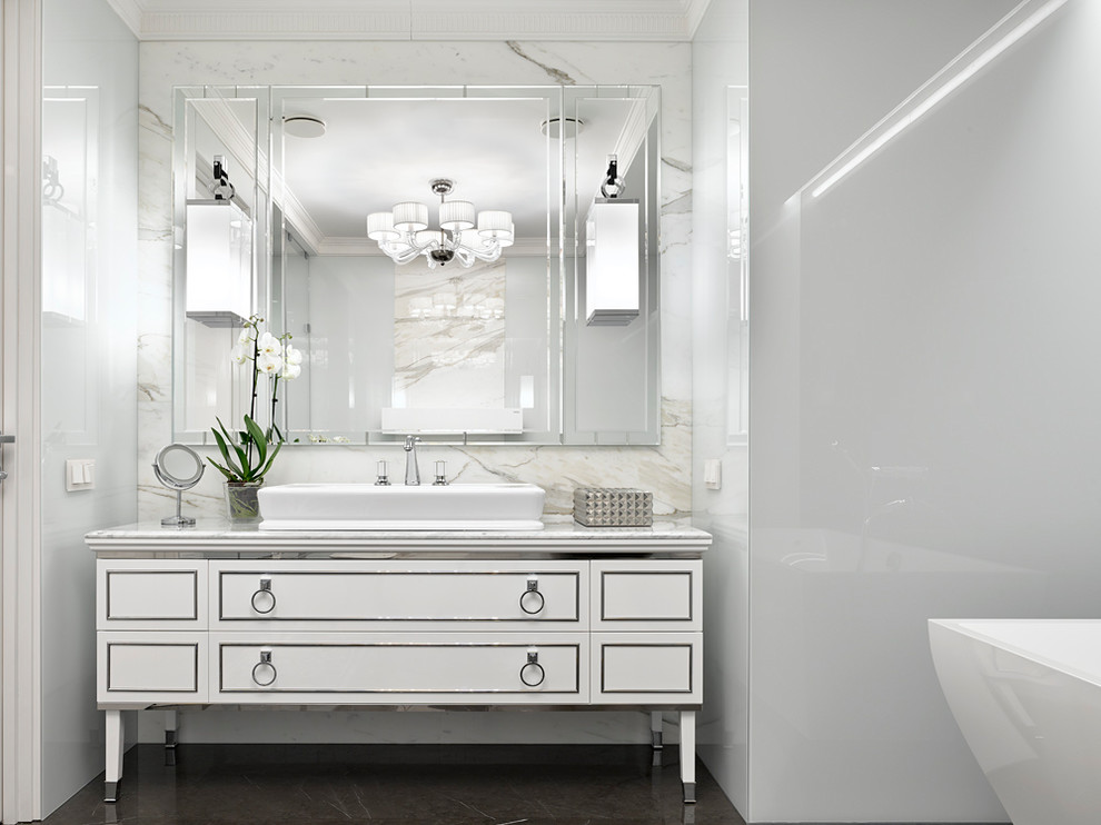 Photo of a contemporary bathroom in Moscow with white cabinets and white walls.