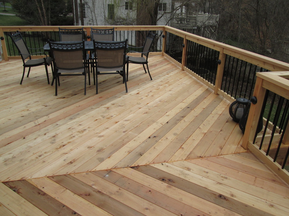 Deck - rustic backyard deck idea in St Louis