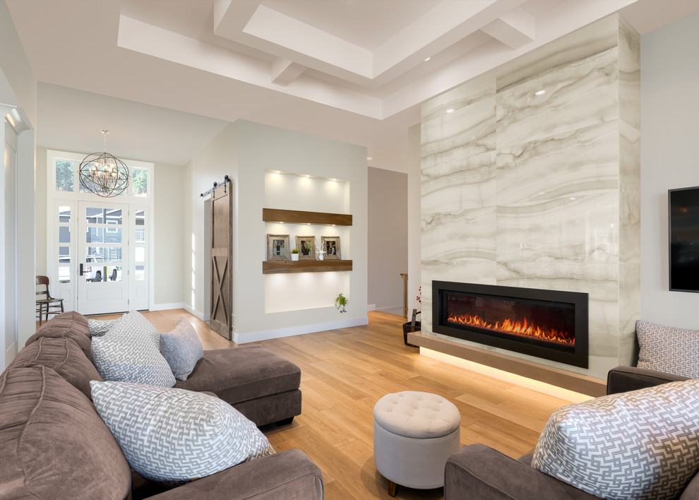 This is an example of a mid-sized transitional formal open concept living room in Vancouver with a ribbon fireplace, a tile fireplace surround and a wall-mounted tv.