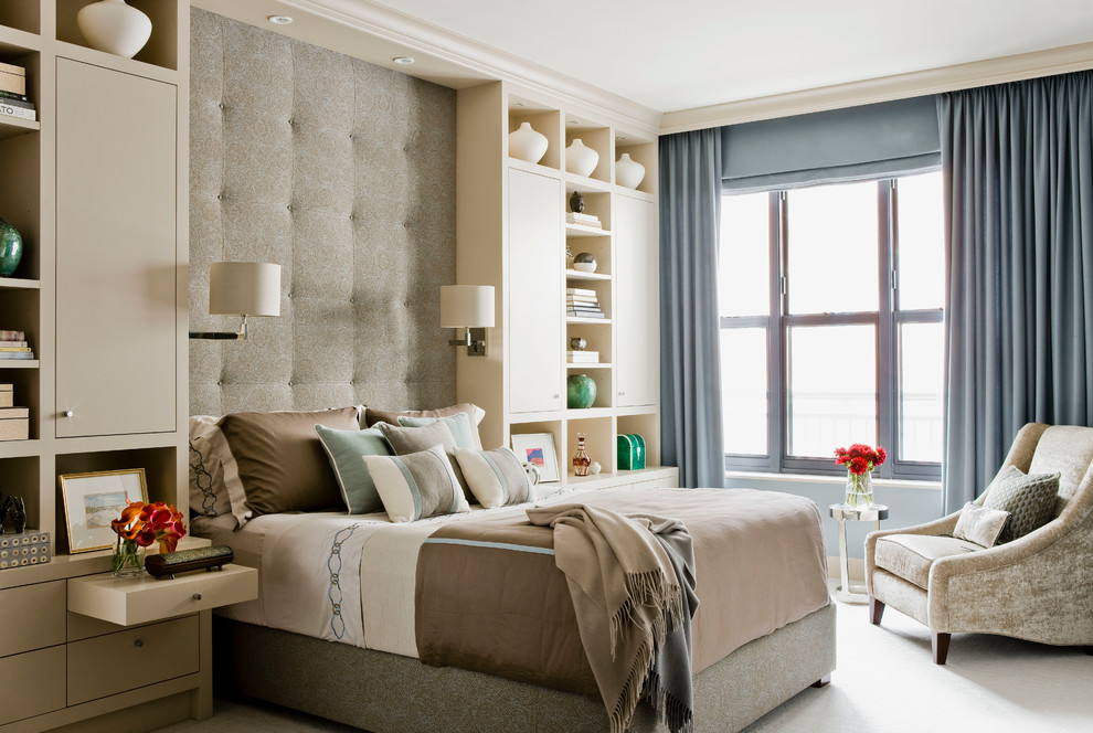 Design ideas for a large contemporary master bedroom in Boston with beige walls and carpet.