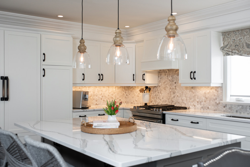 Transitional dark wood floor and brown floor kitchen photo with white cabinets, quartz countertops, paneled appliances, an island and white countertops