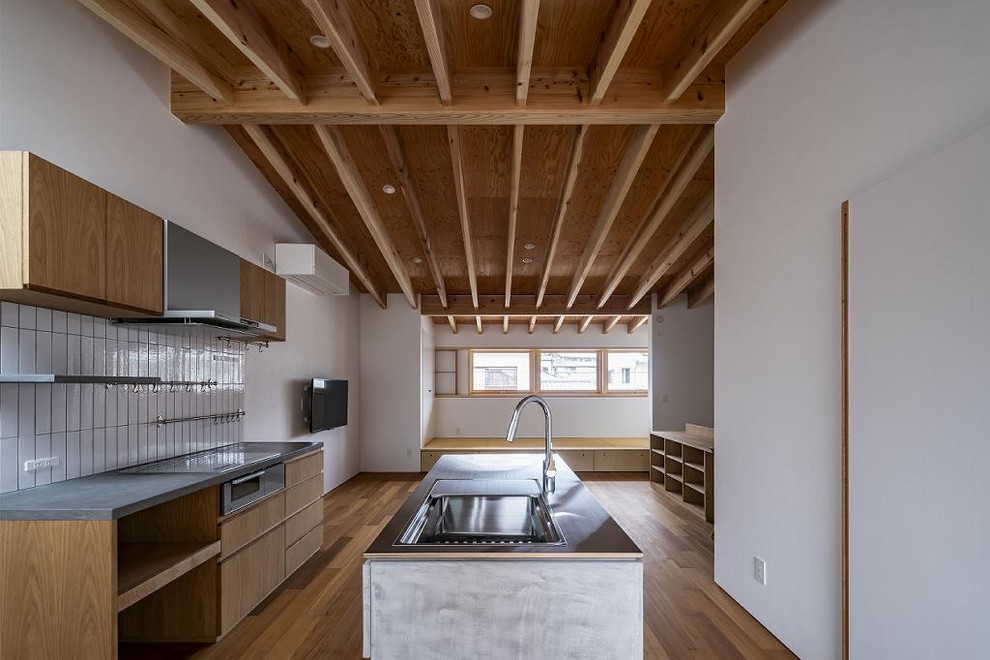 他の地域にあるアジアンスタイルのおしゃれなキッチンの写真