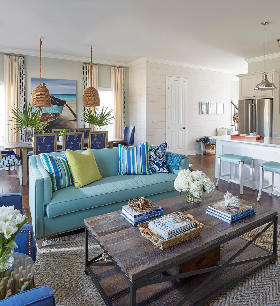 Mid-sized beach style formal open concept living room in Atlanta with beige walls, dark hardwood floors and brown floor.