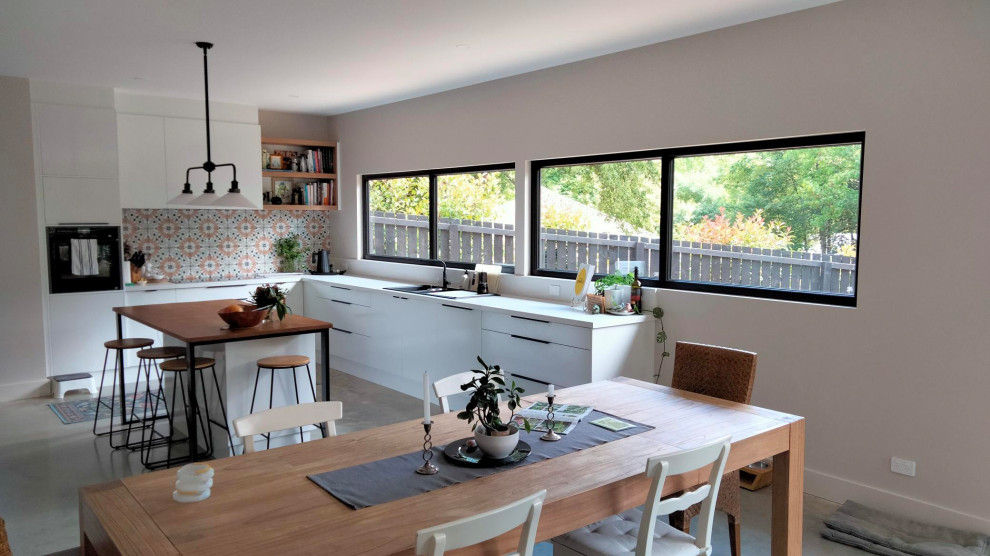 This is an example of a scandinavian dining room in Adelaide.