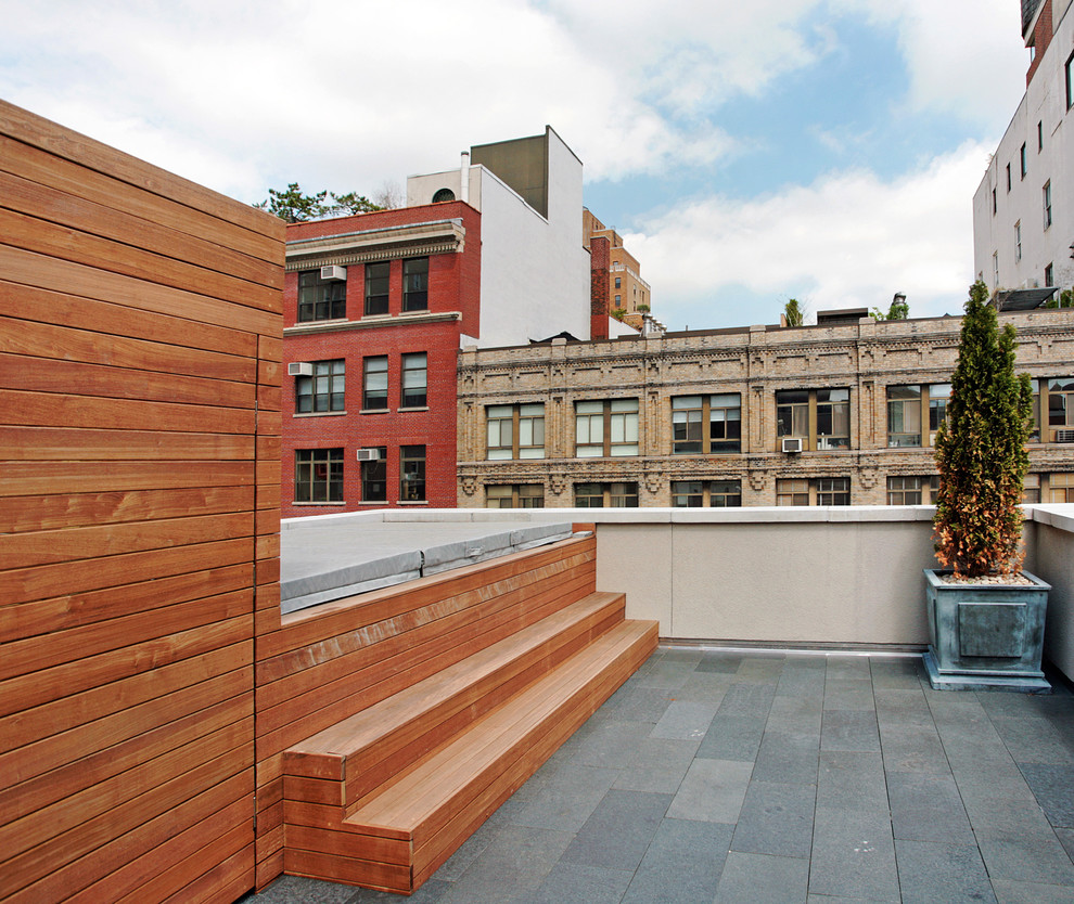 Inspiration for a mid-sized contemporary rooftop deck in New York with no cover.