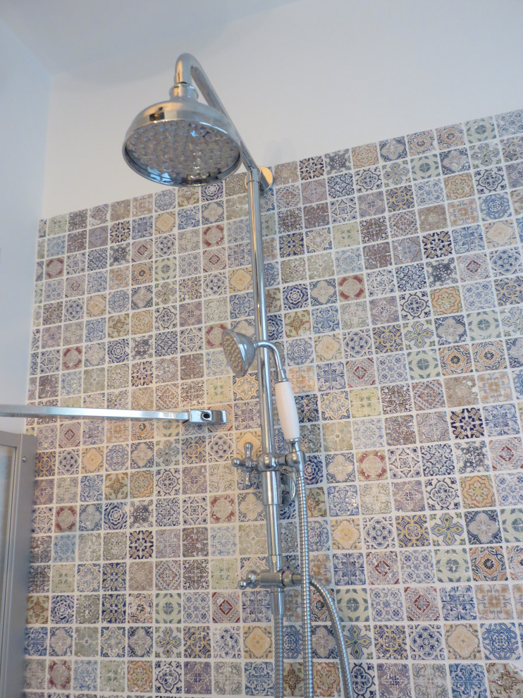 This is an example of a small traditional kids bathroom in Paris with a drop-in tub, multi-coloured tile, mosaic tile, white walls, wood-look tile, a drop-in sink, wood benchtops, brown floor, brown benchtops and a single vanity.
