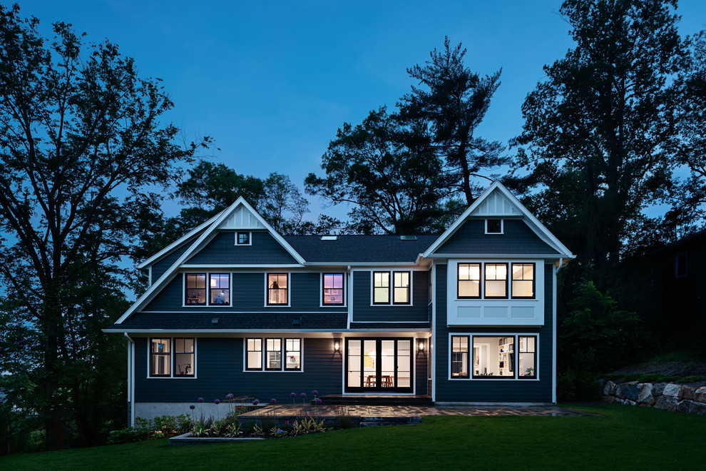 Inspiration for a large transitional gray three-story mixed siding gable roof remodel in New York with a shingle roof