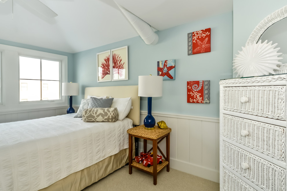 Mid-sized beach style guest bedroom in DC Metro with blue walls, carpet and no fireplace.