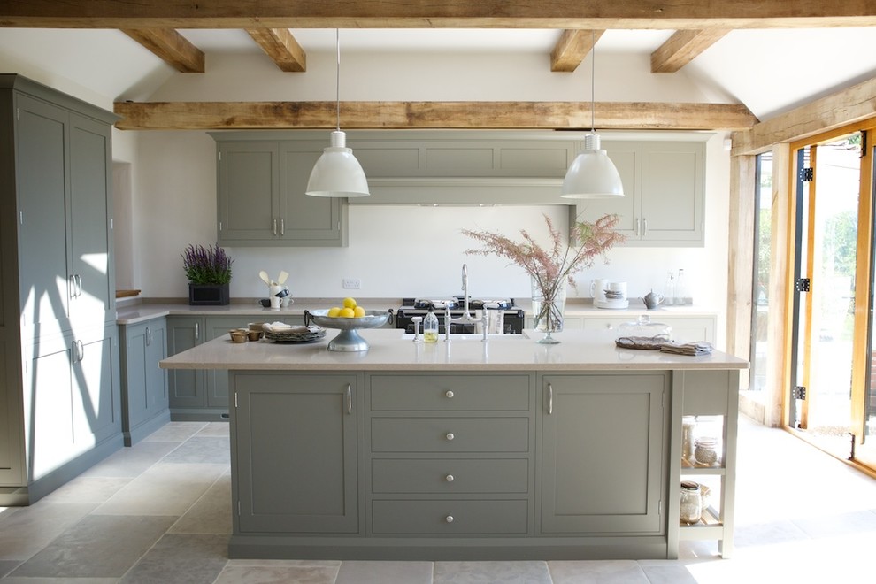 Design ideas for a contemporary open plan kitchen in Sussex with with island.