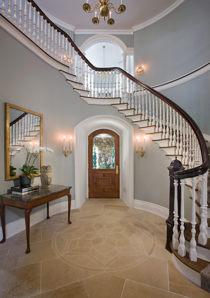 Photo of a traditional foyer in Bridgeport with grey walls, a single front door and a medium wood front door.