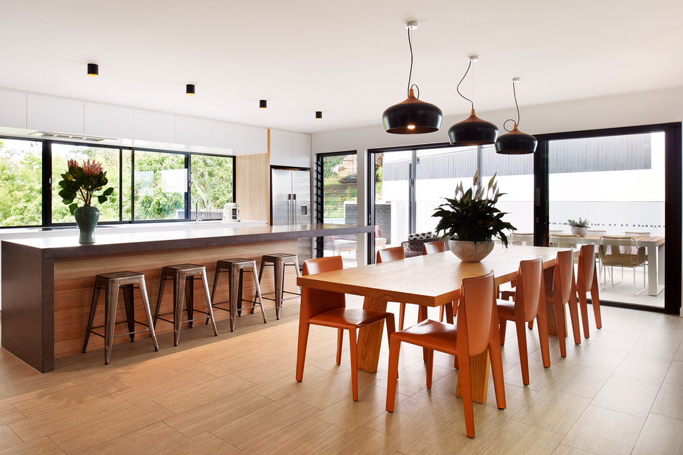 Design ideas for a large contemporary kitchen/dining combo in Brisbane with white walls, ceramic floors and beige floor.