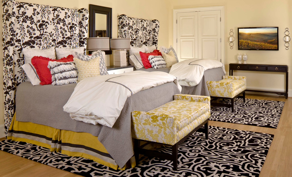 This is an example of a traditional kids' room for girls in Dallas with light hardwood floors.