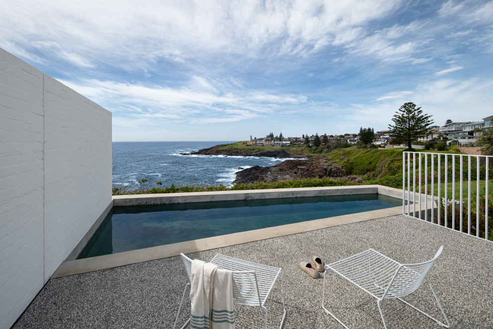 Inspiration for a modern custom-shaped pool in Wollongong with gravel.
