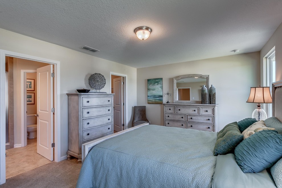 Inspiration for a mid-sized traditional master bedroom in Jacksonville with grey walls, carpet and no fireplace.