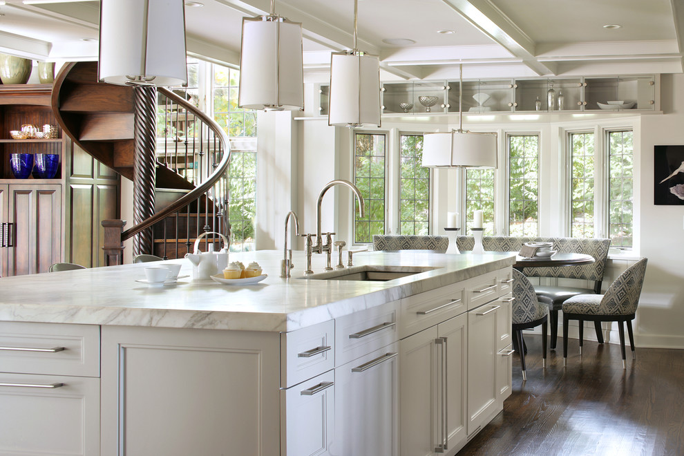 Inspiration for a transitional galley eat-in kitchen in New York with an undermount sink, recessed-panel cabinets, white cabinets and marble benchtops.