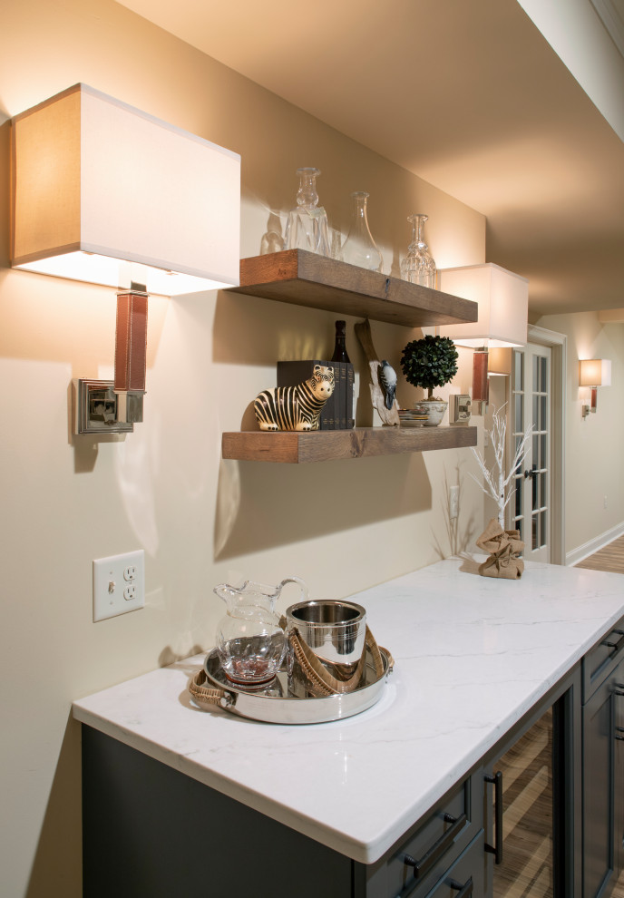 Basement - transitional basement idea with beige walls