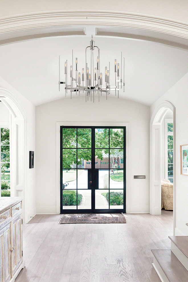 Mid-sized contemporary foyer in Salt Lake City with white walls, light hardwood floors, a double front door, a glass front door and brown floor.