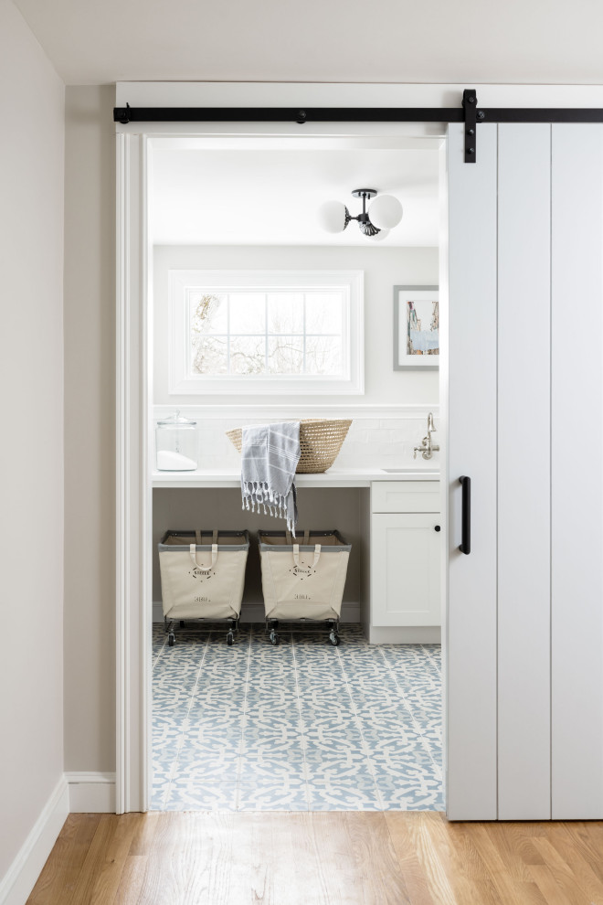 Inspiration for a laundry room remodel in Boston