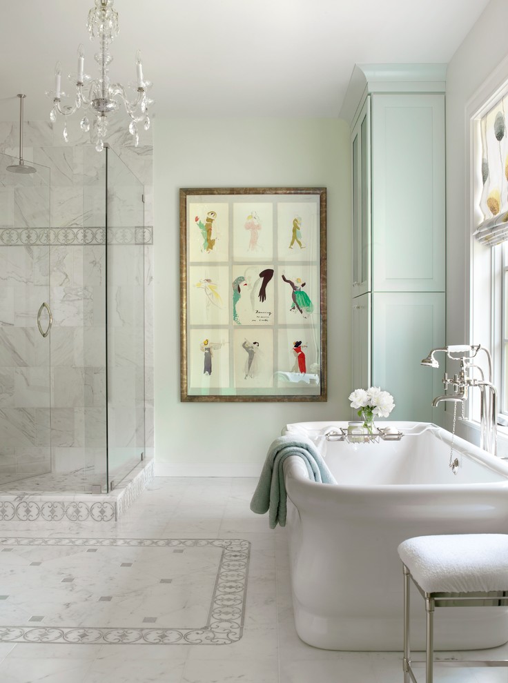 Design ideas for a traditional bathroom in St Louis with ceramic tile and a freestanding tub.