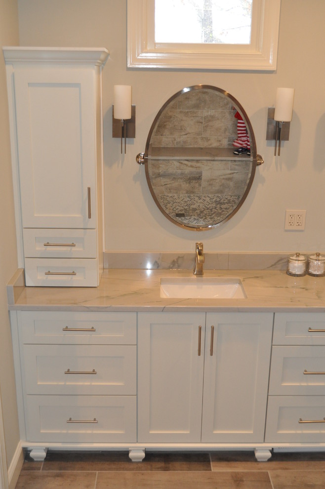 Design ideas for a large traditional master bathroom in Atlanta with flat-panel cabinets, white cabinets, a double shower, gray tile, porcelain tile, grey walls, porcelain floors, an undermount sink, quartzite benchtops and a two-piece toilet.
