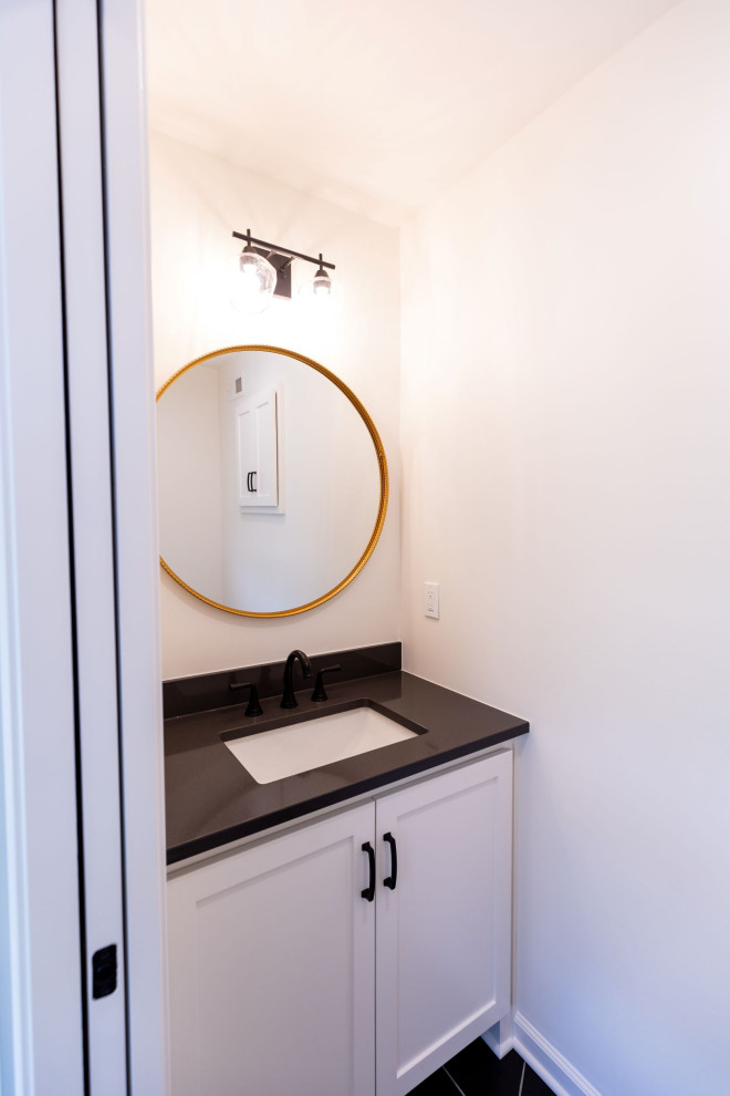This is an example of a contemporary powder room in Kansas City.