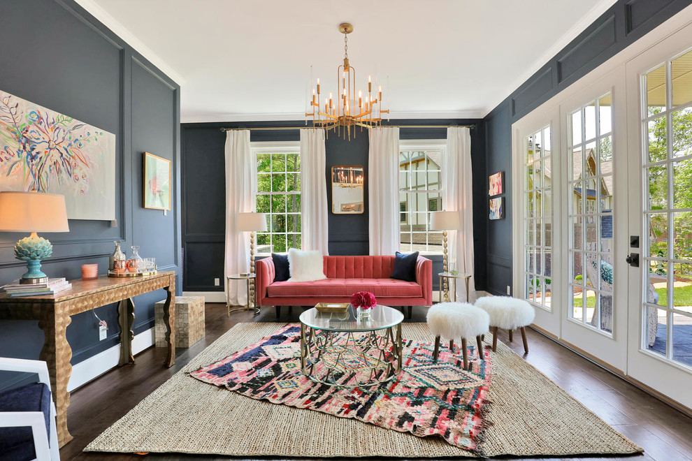 Transitional living room in Richmond with blue walls and dark hardwood floors.