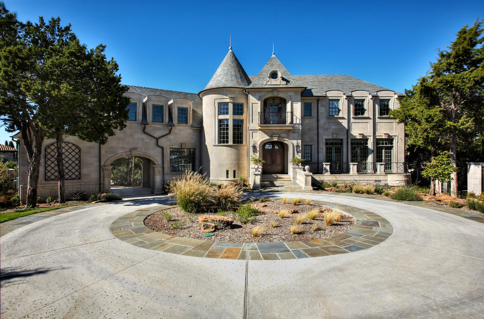 Photo of a traditional exterior in Dallas with stone veneer.