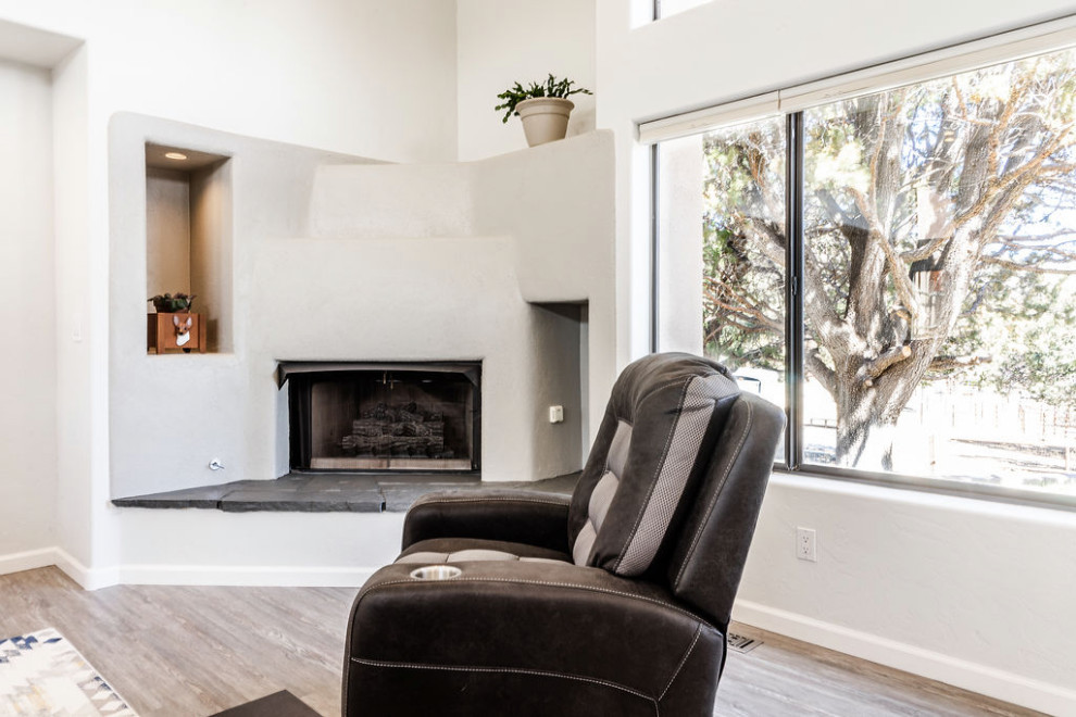 Eat-in kitchen - large transitional u-shaped vinyl floor and gray floor eat-in kitchen idea with an undermount sink, shaker cabinets, gray cabinets, quartzite countertops, green backsplash, subway tile backsplash, stainless steel appliances, an island and white countertops