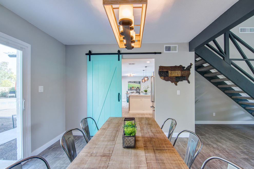 Example of a transitional dining room design in Phoenix