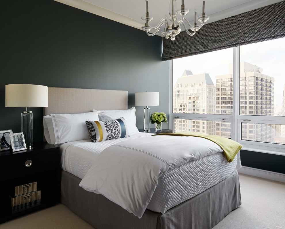 Photo of a mid-sized contemporary guest bedroom in Chicago with black walls, carpet, no fireplace and beige floor.