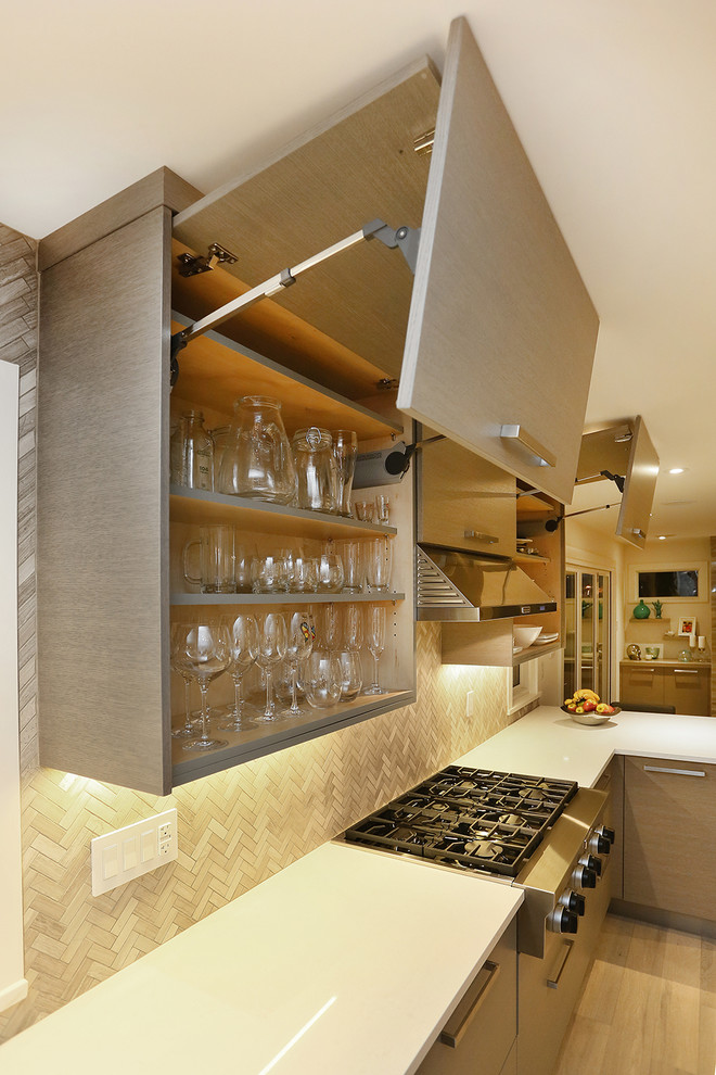 Design ideas for a large contemporary galley kitchen pantry in Vancouver with a drop-in sink, flat-panel cabinets, grey cabinets, quartz benchtops, multi-coloured splashback, ceramic splashback, stainless steel appliances, light hardwood floors and with island.