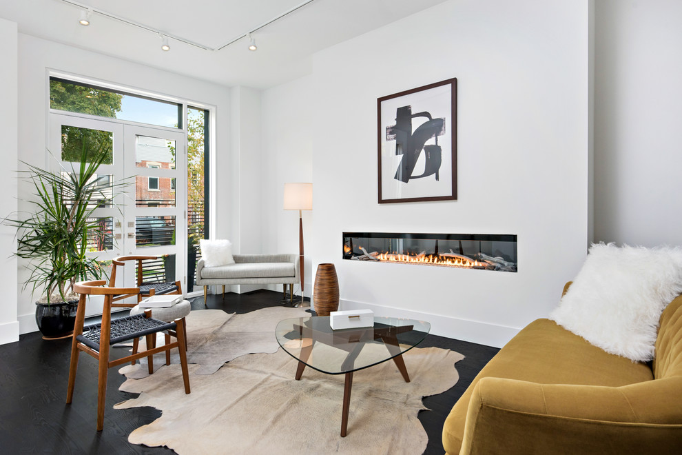 Mid-sized contemporary formal open concept living room in Chicago with white walls, dark hardwood floors, a ribbon fireplace, no tv and black floor.