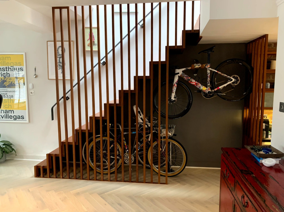 Photo of a medium sized contemporary staircase in London.