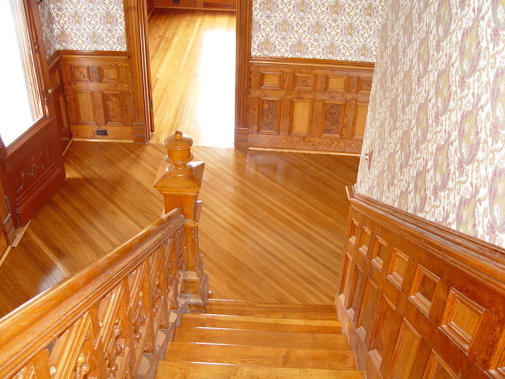 Staircase - mid-sized wooden straight staircase idea in Austin with wooden risers