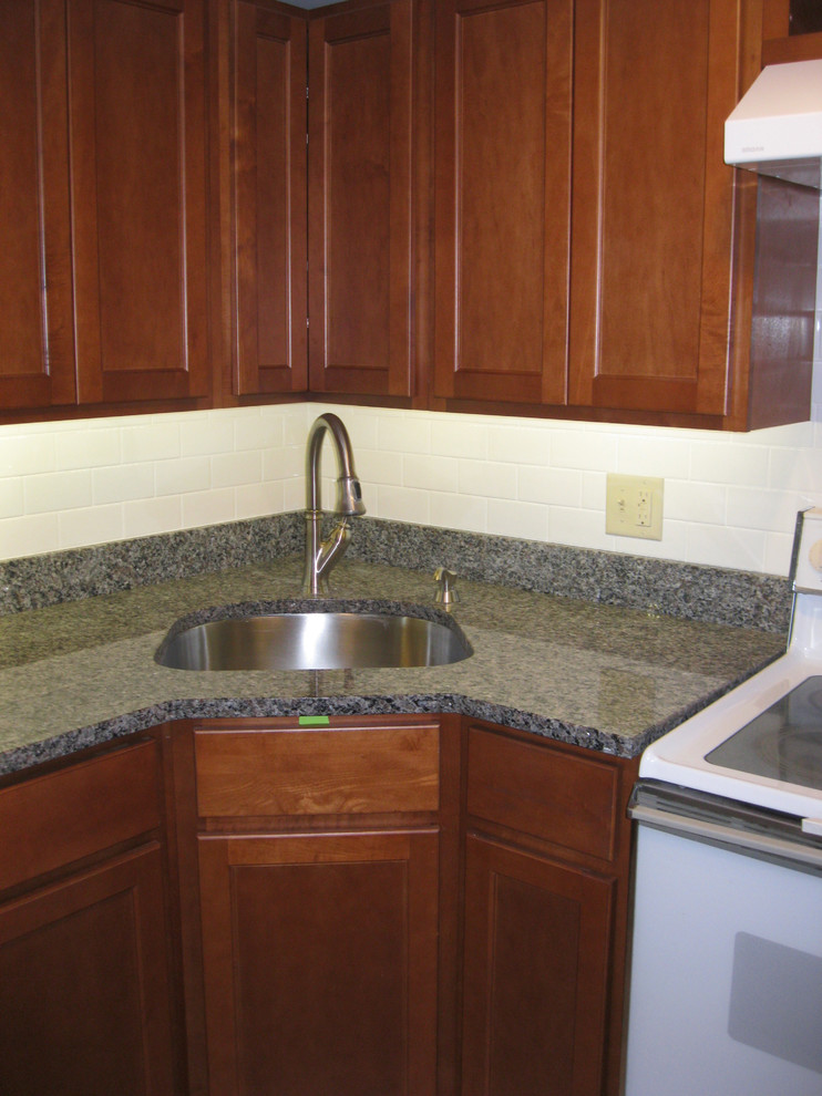 Example of a transitional home design design in Boston
