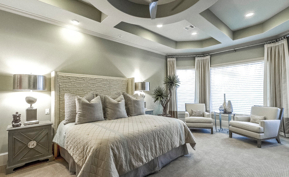 Design ideas for an expansive transitional master bedroom in Houston with carpet and grey walls.