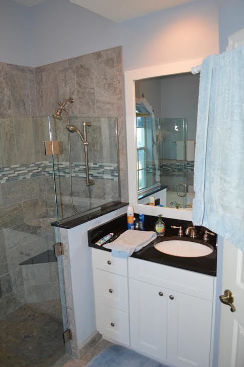 Inspiration for a mid-sized traditional 3/4 bathroom in Tampa with an undermount sink, shaker cabinets, white cabinets, granite benchtops, an alcove tub, a corner shower, blue walls and ceramic floors.