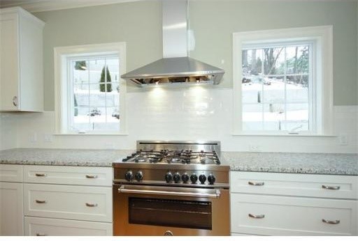 Example of a transitional kitchen design in Boston