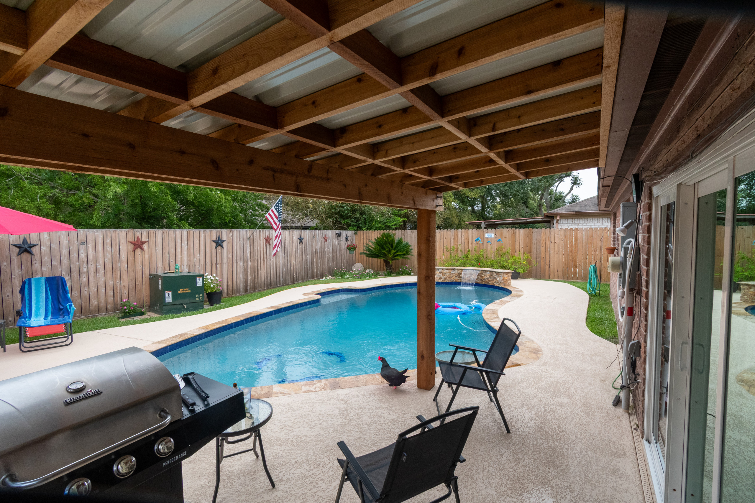 Custom Patio Cover Upgrade – Sealed Cedar & R-Panel Roofin