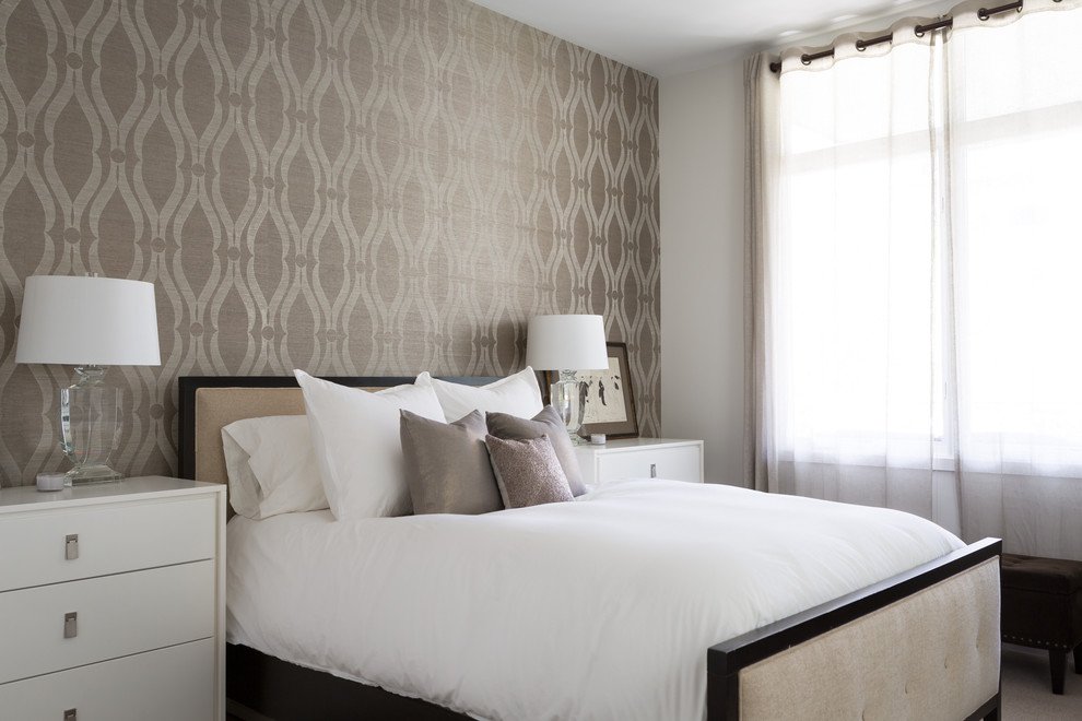 Design ideas for a transitional master bedroom in Denver with beige walls.