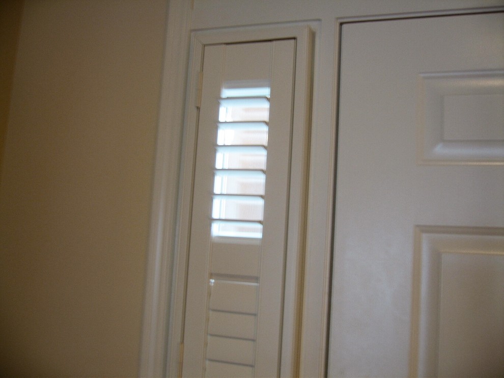 Mid-sized transitional single front door photo in Chicago with beige walls and a white front door