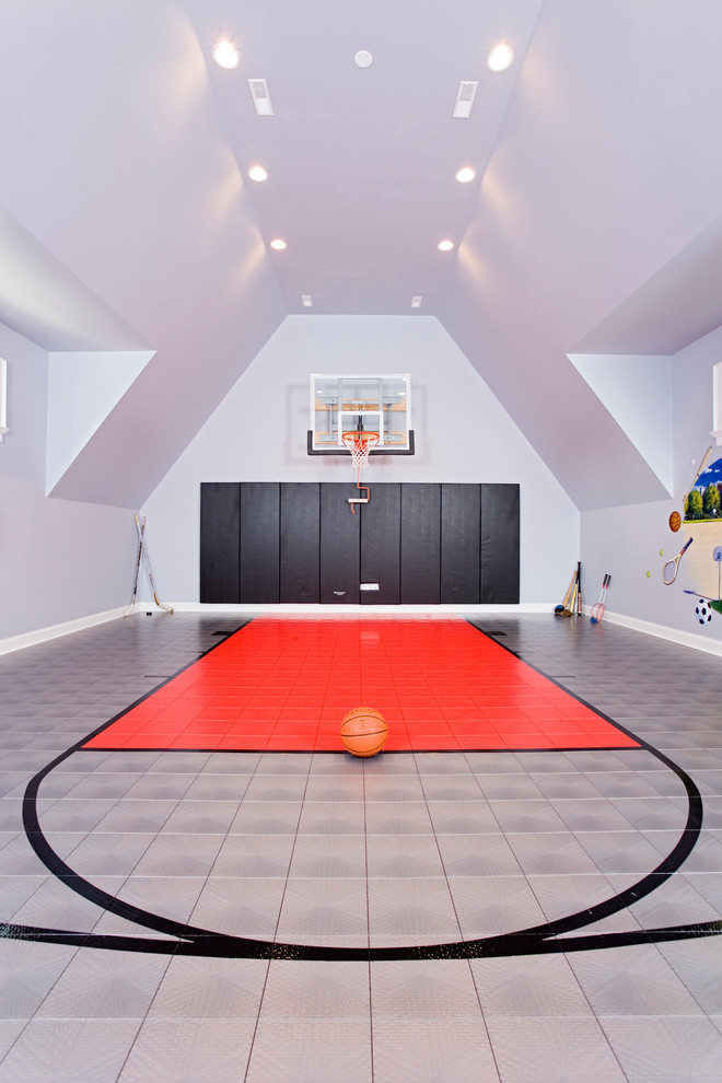 Indoor basketball/tennis/multi-game court - contemporary indoor basketball/tennis/multi-game court idea in Chicago with gray walls