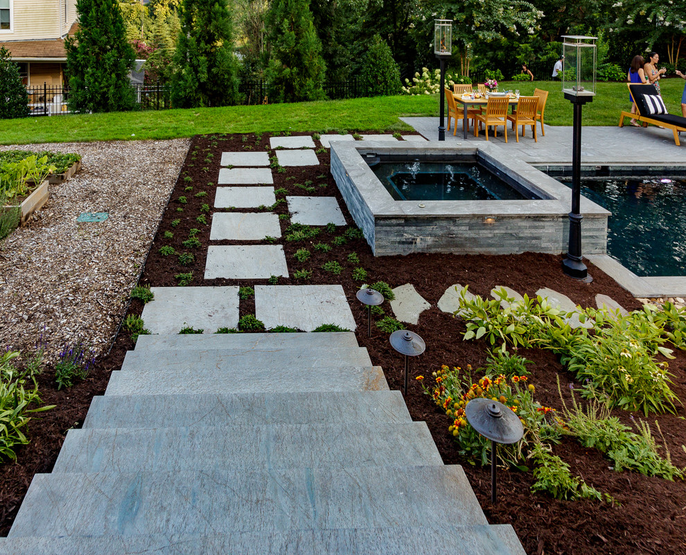 Hot tub - backyard stone and rectangular hot tub idea