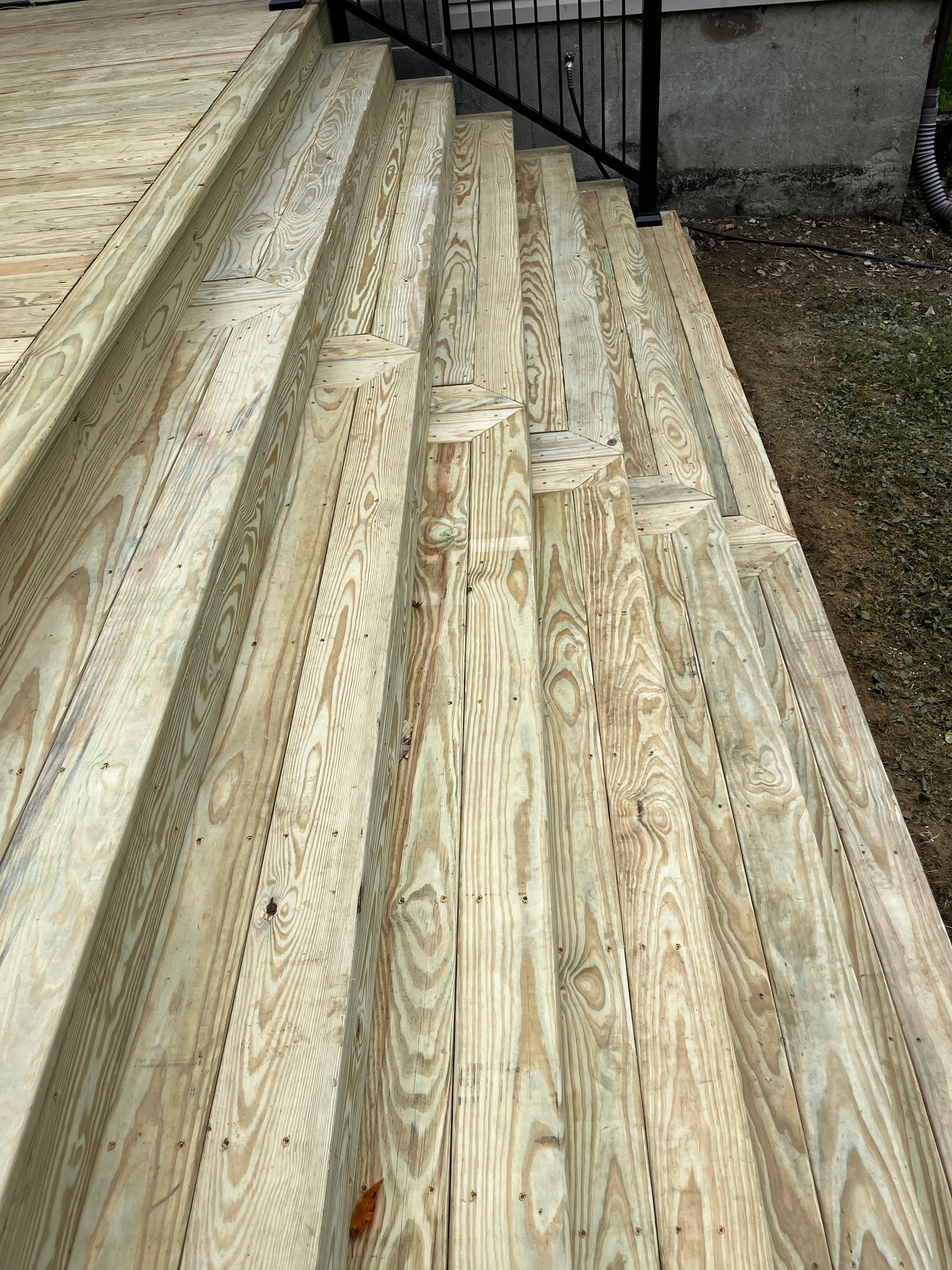 Large pressure treated wood deck