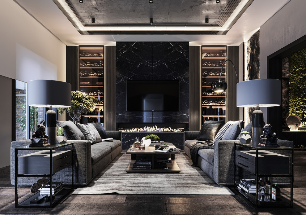 Photo of a large contemporary open concept living room in Moscow with a library, black walls, dark hardwood floors, a hanging fireplace, a stone fireplace surround, a wall-mounted tv and black floor.