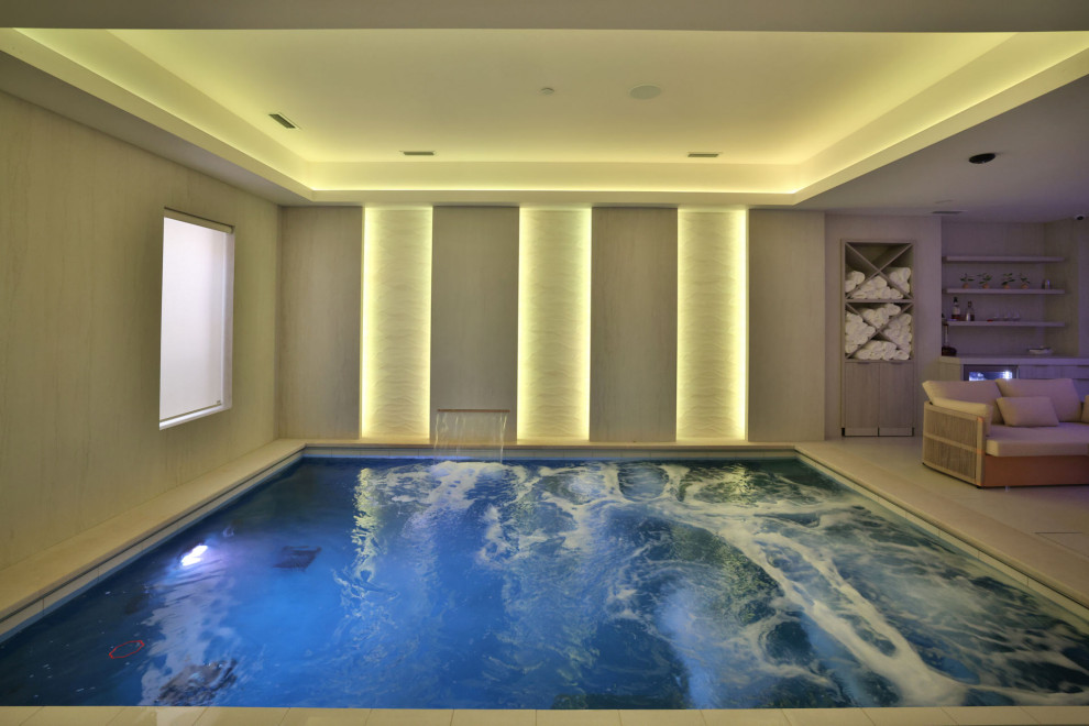 Inspiration for a small indoor rectangular hot tub remodel in Chicago
