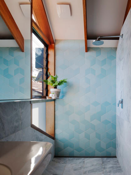 Design ideas for a contemporary bathroom in Melbourne with blue tile and marble floors.