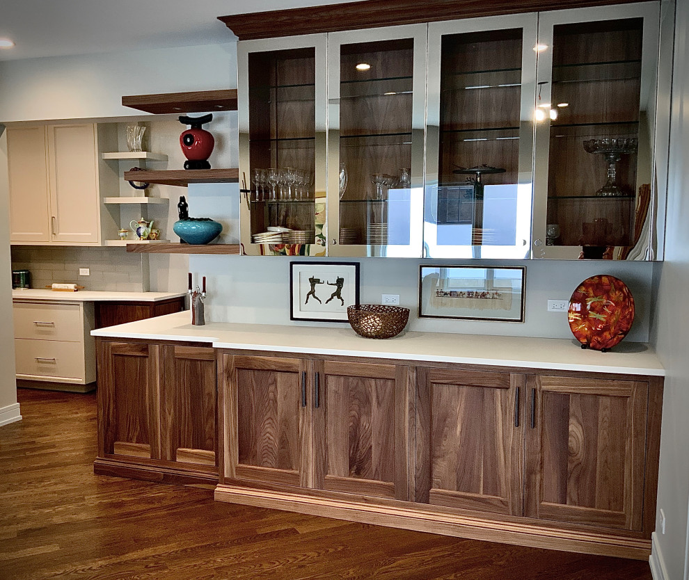Example of a mid-sized transitional medium tone wood floor and brown floor kitchen/dining room combo design in Chicago with gray walls